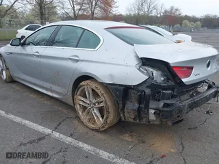 2013 BMW 6 Series 650i xDrive with VIN WBA6B4C53DD098486, listed as a IAAI auction lot 42038491 with 97,771 mi miles. Bid and sale history available at carsss.com. Image 3.