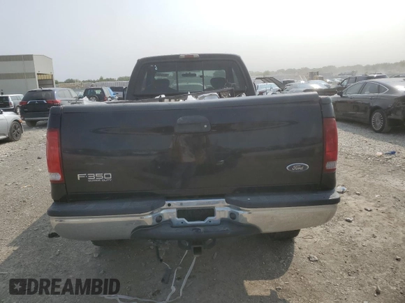 2001 Ford F-350 XL with VIN 1FTSX31F11ED72055, listed as a Copart auction lot 66164624 with 228,597 mi miles and Salvage Title. Bid and sale history available at DreamBid. Image 6.