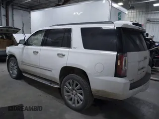 2020 GMC Yukon SLT with VIN 1GKS2BKC2LR175800, listed as a IAAI auction lot 41225753 with 80,333 mi miles. Bid and sale history available at carsss.com. Image 3.