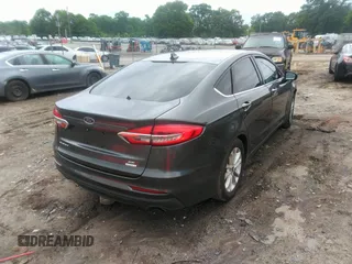 2020 Ford Fusion SE with VIN 3FA6P0HD1LR154966, listed as a IAAI auction lot 42119133 with 133,370 mi miles and . Bid and sale history available at DreamBid. Image 4.