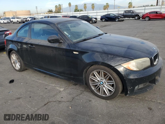 2012 BMW 1 Series 128i with VIN WBAUP9C55CVL91384, listed as a Copart auction lot 77684304 with 201,402 mi miles and Clean title. Bid and sale history available at DreamBid. Image 4.