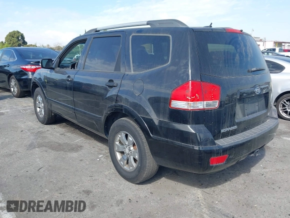 2009 Kia Borrego LX with VIN KNDJJ741095039023, listed as a IAAI auction lot 41696562 with 239,921 mi miles. Bid and sale history available at carsss.com. Image 3.