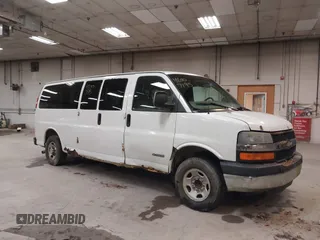 2004 Chevrolet Express Passenger z VIN 1GAHG39U641233542, wystawiony jako IAAI lot #42007195 z przebiegiem 241 963 mil mil oraz . Historia ofert i sprzedaży dostępna na DreamBid. Obrazek 14.