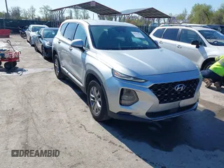 2019 Hyundai Santa Fe SE with VIN 5NMS23AD3KH030862, listed as a IAAI auction lot 41946700 with 198,264 mi miles. Bid and sale history available at carsss.com. Image 1.