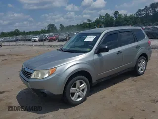 2009 Subaru Forester X with VIN JF2SH616X9H718811, listed as a IAAI auction lot 42446220 with 232,578 mi miles and . Bid and sale history available at DreamBid. Image 2.