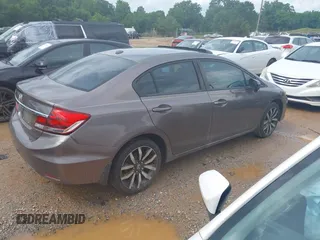 2015 Honda Civic EX-L z VIN 19XFB2F99FE029132, wystawiony jako IAAI lot #42351410 z przebiegiem 256 808 mil mil oraz . Historia ofert i sprzedaży dostępna na DreamBid. Obrazek 4.