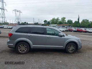 2017 Dodge Journey SXT with VIN 3C4PDDBG8HT577782, listed as a IAAI auction lot 42409731 with 136,618 mi miles and . Bid and sale history available at DreamBid. Image 12.