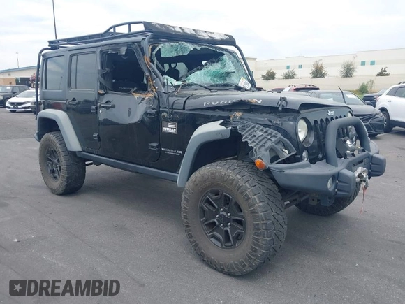 2014 Jeep Wrangler Unlimited Rubicon with VIN 1C4BJWFGXEL172622, listed as a IAAI auction lot 41782796 with 67,594 mi miles. Bid and sale history available at carsss.com. Image 1.
