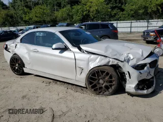 2015 BMW 4 Series 428i xDrive with VIN WBA3T1C55FP820797, listed as a Copart auction lot 74568794 with Not Provided miles and Salvage Title. Bid and sale history available at carsss.com. Image 4.