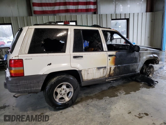 1998 Jeep Grand Cherokee Laredo with VIN 1J4GZ58S2WC222595, listed as a Copart auction lot 51108625 with 0 mi miles and Salvage Title. Bid and sale history available at carsss.com. Image 3.