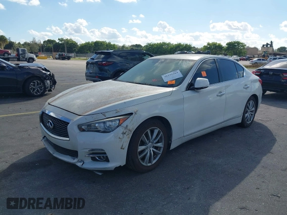 2014 Infiniti Q50 Sport with VIN JN1BV7AR7EM699663, listed as a IAAI auction lot 41532264 with 124,701 mi miles and . Bid and sale history available at DreamBid. Image 2.