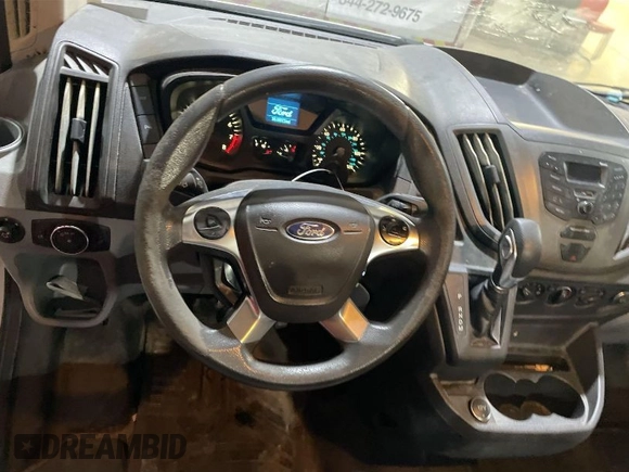 2019 Ford Transit with VIN 1FTYE1YM0KKB31969, listed as a IAAI auction lot 42083116 with 161,014 mi miles. Bid and sale history available at carsss.com. Image 1.