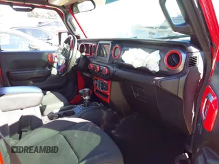 2022 Jeep Gladiator Willys Sport z VIN 1C6HJTAG0NL180848, wystawiony jako IAAI lot #41778129 z przebiegiem Nie podano mil oraz . Historia ofert i sprzedaży dostępna na DreamBid. Obrazek 5.