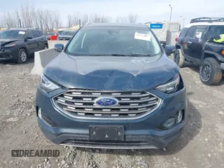 2019 Ford Edge SEL z VIN 2FMPK4J9XKBC58603, wystawiony jako IAAI lot #41814067 z przebiegiem 135 198 mil mil oraz . Historia ofert i sprzedaży dostępna na DreamBid. Obrazek 12.