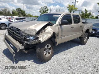 2008 Toyota Tacoma PreRunner with VIN 3TMJU62N88M049783, listed as a Copart auction lot 60340165 with 180,718 mi miles and Salvage title. Bid and sale history available at DreamBid. Image 1.