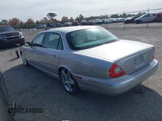 2005 Jaguar XJ with VIN SAJWA79C05SG45650, listed as a IAAI auction lot 41262315 with 76,127 mi miles. Bid and sale history available at carsss.com. Image 3.