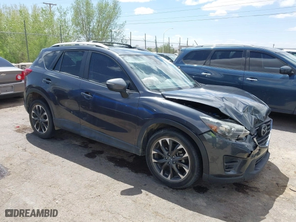 2016 Mazda CX-5 Grand Touring with VIN JM3KE4DY7G0643643, listed as a IAAI auction lot 42077497 with 120,343 mi miles. Bid and sale history available at carsss.com. Image 13.