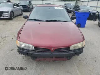 1997 Mitsubishi Mirage DE z VIN JA3AY26AXVU007285, wystawiony jako Copart lot #71958454 z przebiegiem 156 415 mil mil oraz Szkoda całkowita • Salvage title. Historia ofert i sprzedaży dostępna na DreamBid. Obrazek 5.