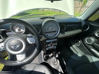 2007 MINI Hardtop S with VIN WMWMF73527TL89620, listed as a Copart auction lot 52344035 with 105,600 mi miles and Clean Title. Bid and sale history available at DreamBid. Image 9.