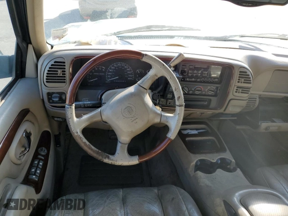 2000 Cadillac Escalade z VIN 1GYEK13R0YR167895, wystawiony jako Copart lot #82586443 z przebiegiem 267 099 mil mil oraz Szkoda całkowita • Salvage title. Historia ofert i sprzedaży dostępna na DreamBid. Obrazek 8.