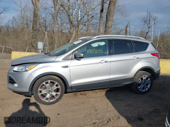 2015 Ford Escape Titanium z VIN 1FMCU0J91FUC41531, wystawiony jako IAAI lot #41903203 z przebiegiem 118 962 mil mil oraz . Historia ofert i sprzedaży dostępna na DreamBid. Obrazek 14.