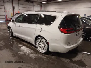 2021 Chrysler Pacifica Touring L with VIN 2C4RC1BG3MR504293, listed as a IAAI auction lot 41728608 with 70,487 mi miles and . Bid and sale history available at DreamBid. Image 3.
