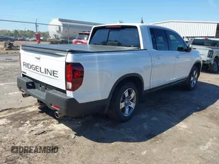 2024 Honda Ridgeline RTL z VIN 5FPYK3F54RB026656, wystawiony jako IAAI lot #41878732 z przebiegiem 15 585 mil mil oraz . Historia ofert i sprzedaży dostępna na DreamBid. Obrazek 4.