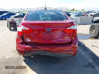 2015 Ford Fiesta SE with VIN 3FADP4BJ4FM149307, listed as a IAAI auction lot 42078091 with 124,529 mi miles. Bid and sale history available at carsss.com. Image 16.