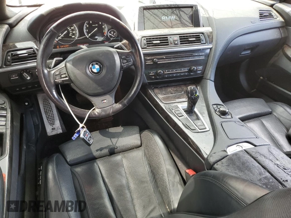 2013 BMW 6 Series 650i with VIN WBA6B2C59DDG66702, listed as a Copart auction lot 52327905 with 112,300 mi miles and Salvage Title. Bid and sale history available at DreamBid. Image 8.