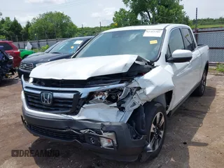 2020 Honda Ridgeline RTL with VIN 5FPYK3F51LB029859, listed as a IAAI auction lot 42462285 with 57,399 mi miles and . Bid and sale history available at DreamBid. Image 6.