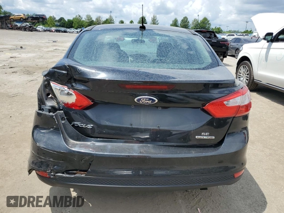 2013 Ford Focus SE with VIN 1FADP3F20DL371550, listed as a Copart auction lot 62750745 with Not provided miles and Salvage title. Bid and sale history available at DreamBid. Image 6.