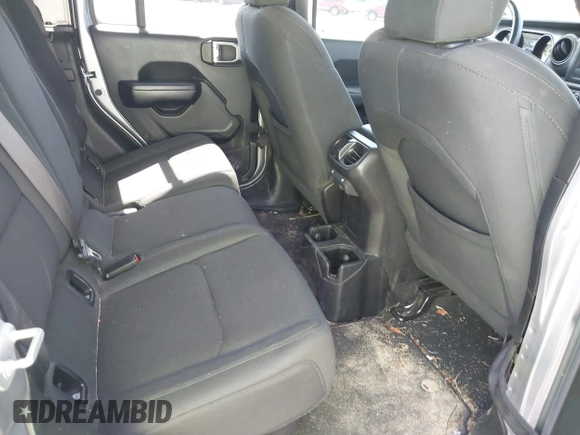 2020 Jeep Gladiator Sport S with VIN 1C6HJTAG7LL128940, listed as a IAAI auction lot 42108154 with 90,596 mi miles and . Bid and sale history available at DreamBid. Image 8.