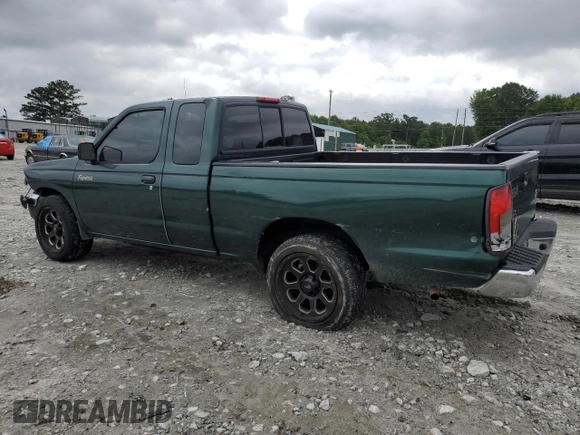 2000 Nissan Frontier XE with VIN 1N6DD26SXYC400648, listed as a Copart auction lot 58756855 with 148,051 mi miles and Salvage title. Bid and sale history available at DreamBid. Image 2.