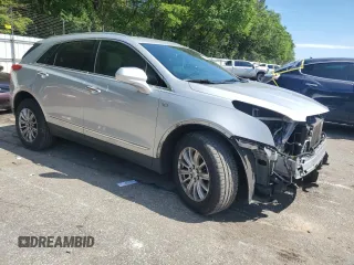 2017 Cadillac XT5 FWD с VIN 1GYKNARS9HZ107327, выставлен на аукционе Copart как лот 56099575 с пробегом 111 718 миль миль и Списание • Salvage title. История ставок и продаж доступна на DreamBid. Изображение 4.