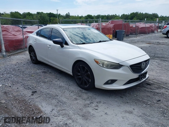 2014 Mazda 6 i Grand Touring with VIN JM1GJ1W67E1139945, listed as a IAAI auction lot 42194243 with 205,545 mi miles. Bid and sale history available at carsss.com. Image 1.