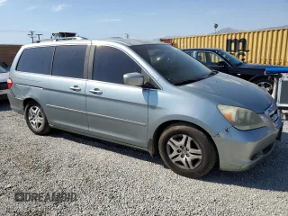 2005 Honda Odyssey EX with VIN 5FNRL38405B099581, listed as a Copart auction lot 52970815 with 218,225 mi miles and Salvage Title. Bid and sale history available at carsss.com. Image 4.