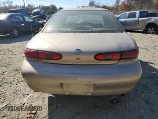 1999 Mercury Sable LS z VIN 1MEFM53S7XG602788, wystawiony jako Copart lot #76894294 z przebiegiem 186 315 mil mil oraz Szkody całkowita. Historia ofert i sprzedaży dostępna na DreamBid. Obrazek 6.