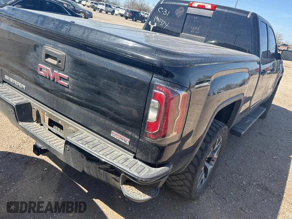 2017 GMC Sierra 1500 SLT z VIN 1GTV2NEC3HZ246368, wystawiony jako Copart lot #50406265 z przebiegiem 140 936 mil mil oraz Czysty tytuł • Clean title. Historia ofert i sprzedaży dostępna na DreamBid. Obrazek 4.