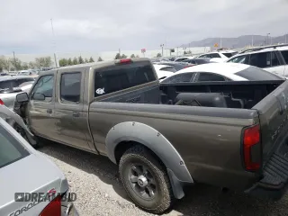 2002 Nissan Frontier XE z VIN 1N6ED29X92C367175, wystawiony jako Copart lot #54979685 z przebiegiem 281 470 mil mil oraz Szkoda całkowita • Salvage title. Historia ofert i sprzedaży dostępna na DreamBid. Obrazek 2.