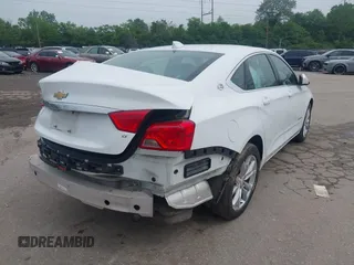 2018 Chevrolet Impala LT z VIN 2G1105S38J9167067, wystawiony jako IAAI lot #42284636 z przebiegiem 99 824 mil mil oraz . Historia ofert i sprzedaży dostępna na DreamBid. Obrazek 19.