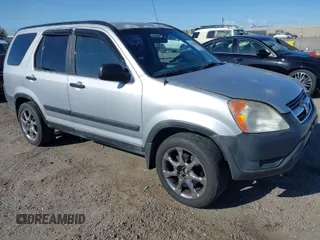 2002 Honda CR-V LX with VIN JHLRD68432C019992, listed as a IAAI auction lot 41963062 with 154,917 mi miles and . Bid and sale history available at carsss.com. Image 1.