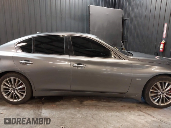 2018 Infiniti Q50 3.0t LUXE with VIN JN1EV7AR8JM610044, listed as a IAAI auction lot 41733252 with 116,320 mi miles. Bid and sale history available at carsss.com. Image 13.