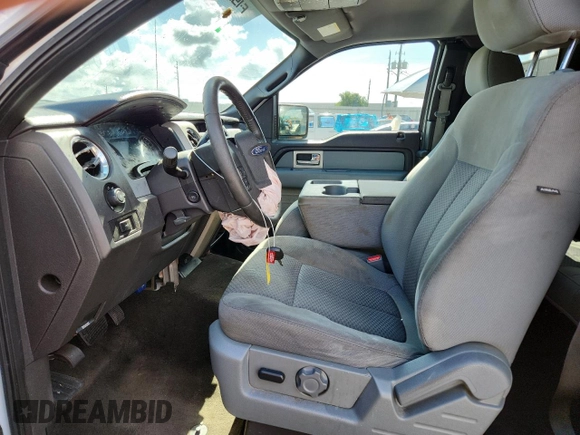 2011 Ford F-150 XL with VIN 1FTEX1CM5BFB48134, listed as a Copart auction lot 63298945 with 218,595 mi miles and Salvage title. Bid and sale history available at DreamBid. Image 7.