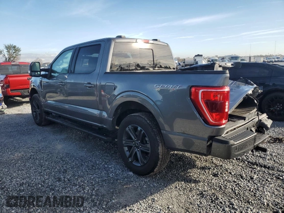 2023 Ford F-150 XL with VIN 1FTEW1EP4PFB38678, listed as a Copart auction lot 43024045 with 8,718 mi miles and Salvage title. Bid and sale history available at DreamBid. Image 2.