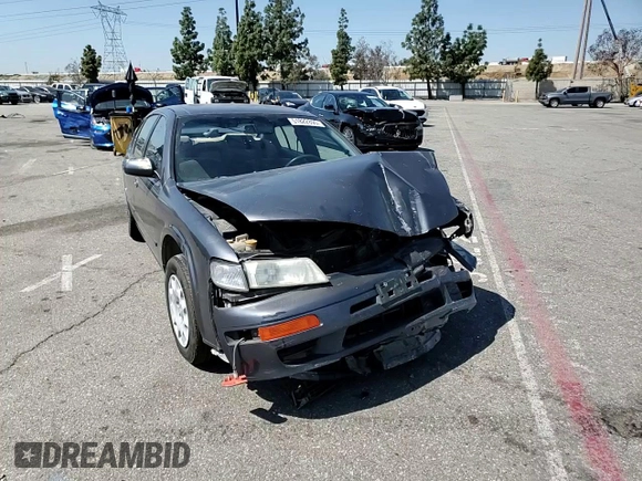1999 Nissan Maxima GXE z VIN JN1CA21D9XM409448, wystawiony jako Copart lot #51822895 z przebiegiem Nie podano mil oraz Szkoda całkowita • Salvage title. Historia ofert i sprzedaży dostępna na DreamBid. Obrazek 10.
