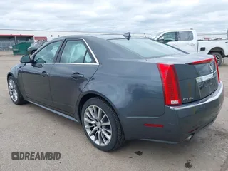 2012 Cadillac CTS Luxury with VIN 1G6DG5E51C0122078, listed as a IAAI auction lot 42086692 with 125,231 mi miles and . Bid and sale history available at DreamBid. Image 3.