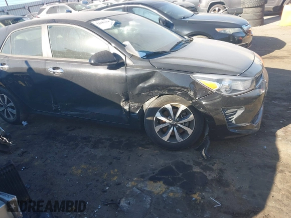 2022 Kia Rio S with VIN 3KPA25AD8NE443590, listed as a IAAI auction lot 41684325 with 73,231 mi miles and . Bid and sale history available at DreamBid. Image 6.