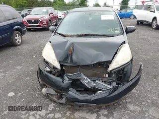 2009 Honda Fit Sport with VIN JHMGE88469S055316, listed as a IAAI auction lot 42306333 with 144,377 mi miles and . Bid and sale history available at DreamBid. Image 6.