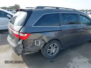 2012 Honda Odyssey EX-L with VIN 5FNRL5H60CB094682, listed as a IAAI auction lot 41570797 with 127,890 mi miles and . Bid and sale history available at carsss.com. Image 17.