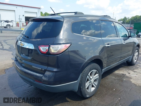 2015 Chevrolet Traverse LT with VIN 1GNKVHKD1FJ352801, listed as a IAAI auction lot 42603454 with 110,991 mi miles and . Bid and sale history available at DreamBid. Image 4.